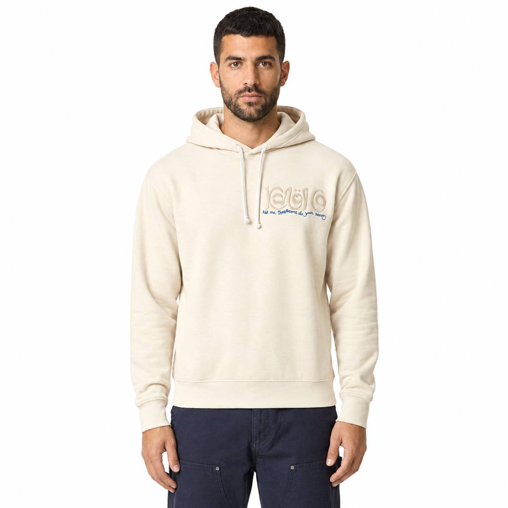 Man modeling the front of an ivory MATADORA glow-in-the-dark unisex hoodie