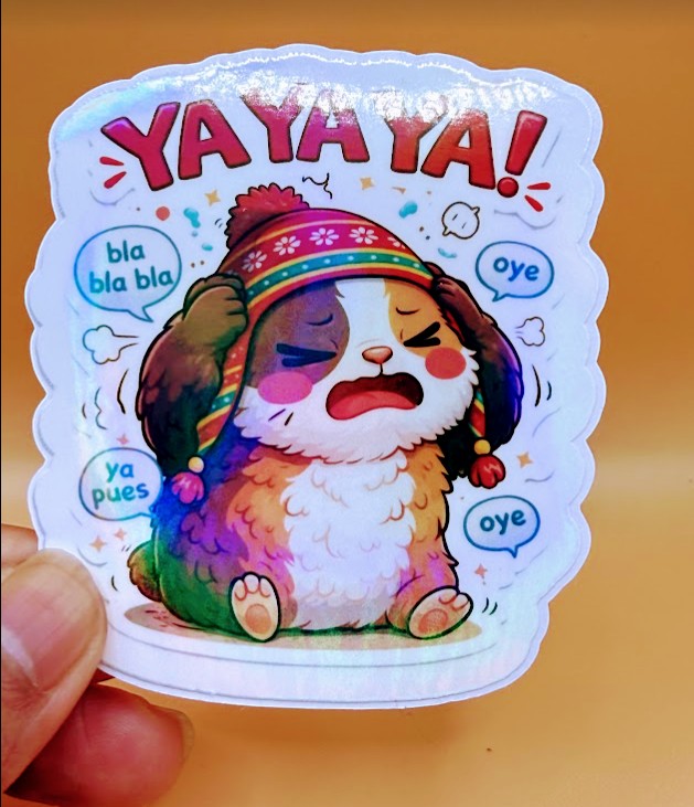 Todo Tumi Ya Ya Ya! holographic laminated sticker featuring a cute guinea pig in a Peruvian chullo hat.