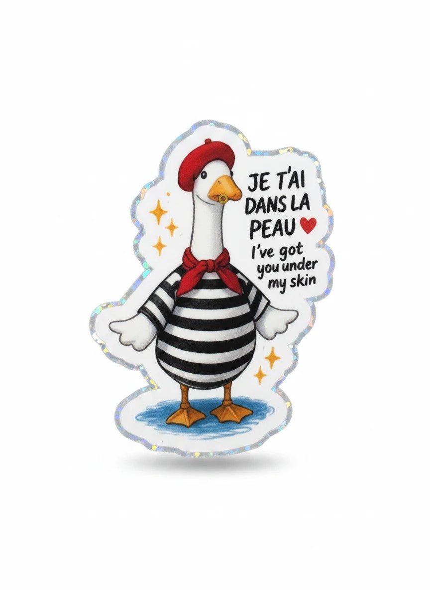 Todo Tumi holographic sticker featuring a goose in a red beret and striped shirt with French text and a heart.