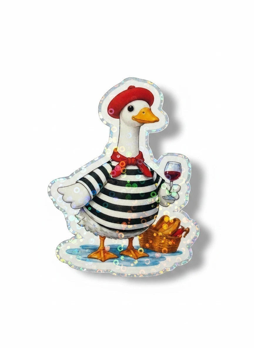 Todo Tumi holographic sticker featuring a French goose in a striped shirt, beret, and wine glass with a baguette.