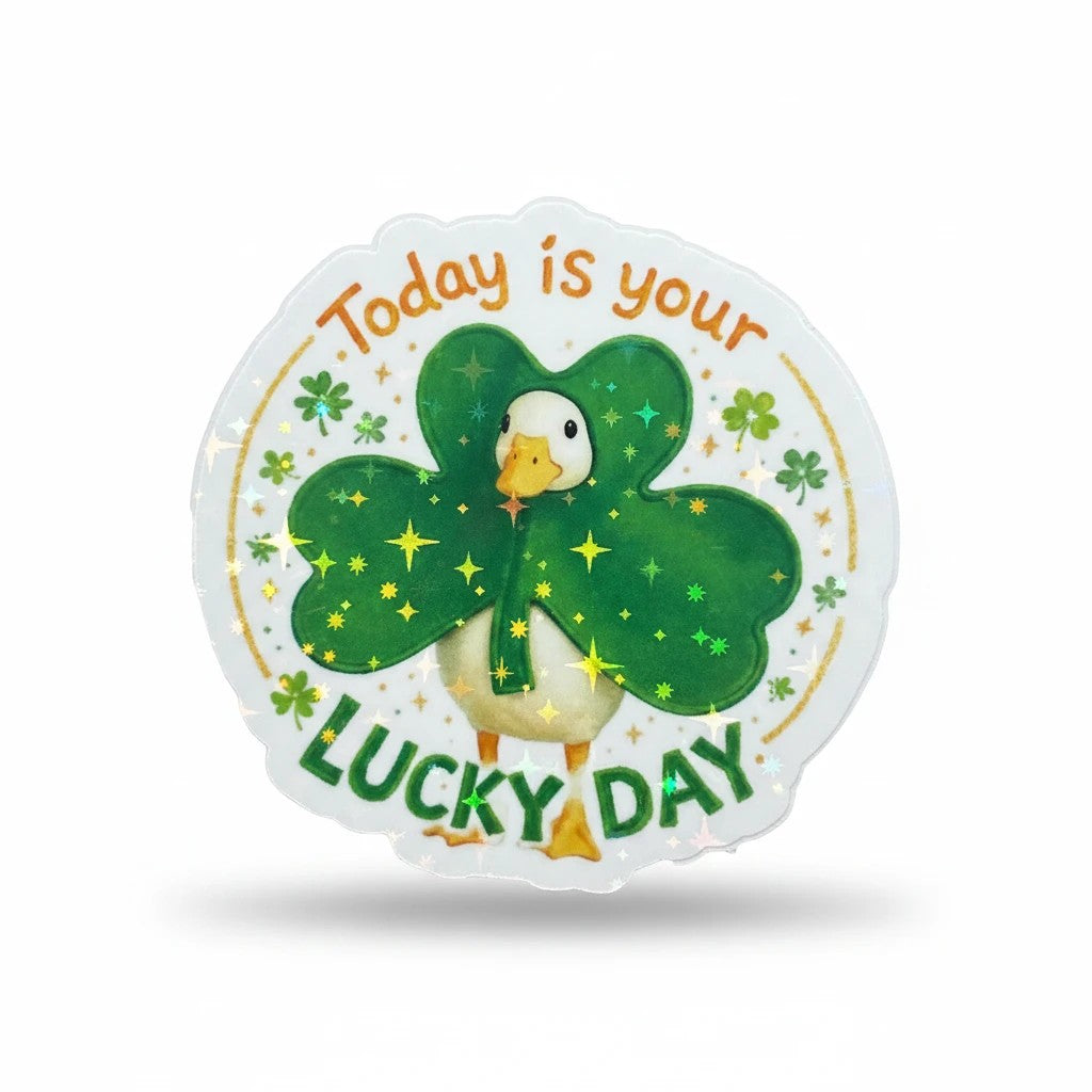 Todo Tumi holographic sticker featuring a cute goose wearing a shamrock costume with the text Today is your Lucky Day