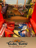 Todo Tumi Al Fondo Hay Sitio gift box filled with assorted Peruvian chocolates, featuring a decorative interior scene.